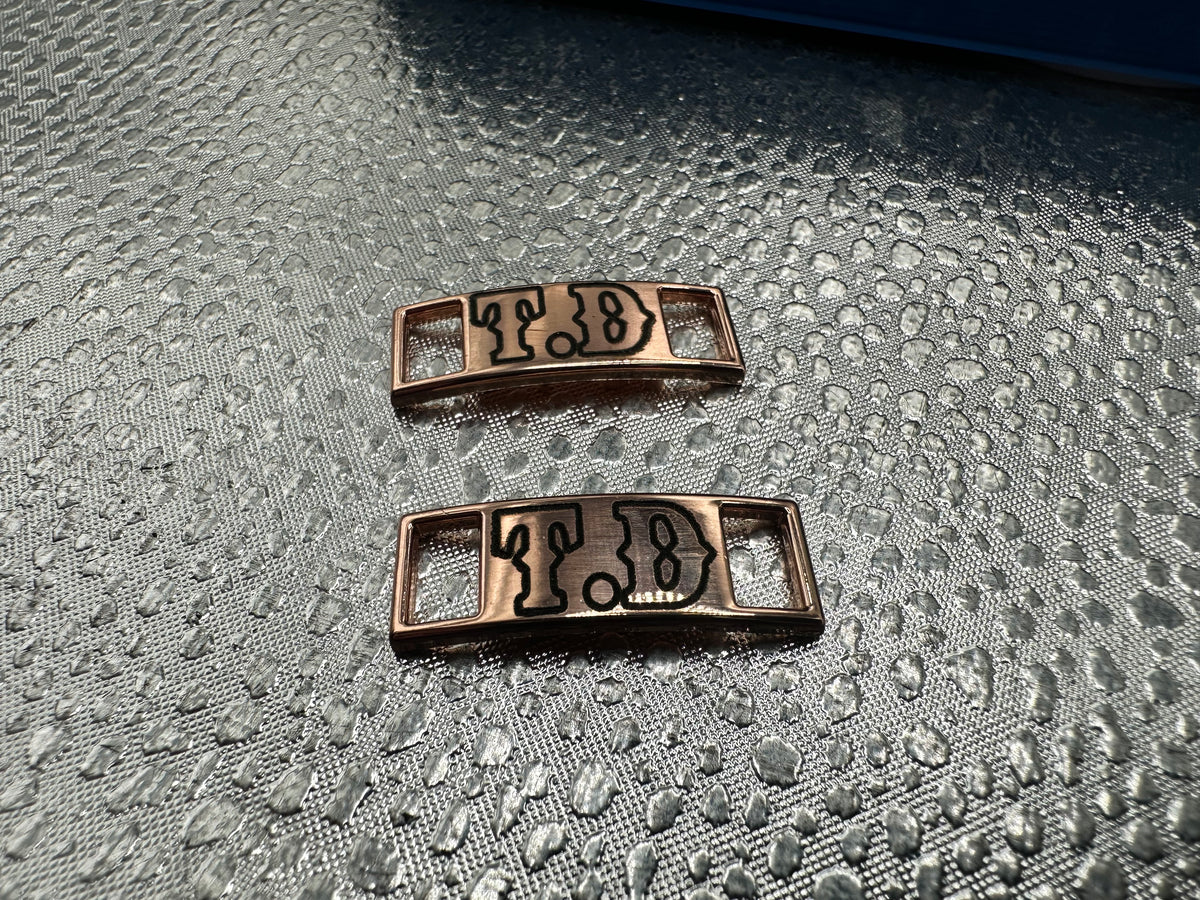 Lace up boot keeper plates