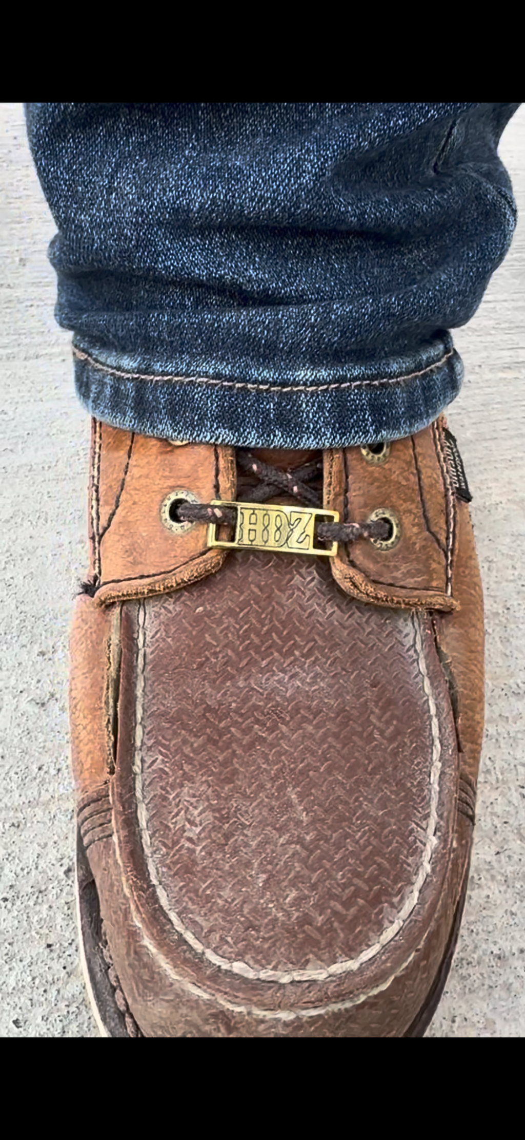 Lace up boot keeper plates