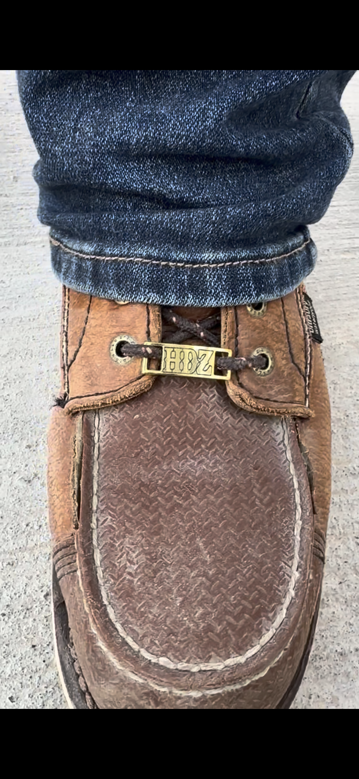 Lace up boot keeper plates
